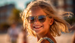 Smiling child outdoors, enjoying summer, wearing sunglasses, carefree and cheerful generated by AI