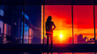 Woman standing in front of window with the sun setting in the background.