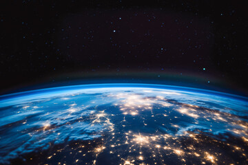 planet earth from space with lights visible. vision of sunrise over the earth visible from space. ci