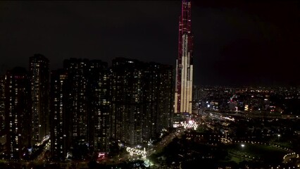 Sticker - 4k Aerial Drone Footage - Skyline of Saigon, Vietnam at Night.