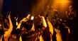 © NVB Stocker - music concert live on stage. Audience Captures the show with smartphone. diverse young people dancing in night club. Nightlife and disco dance party concept. Fun music festival