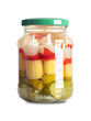 Party skewers, with pickled vegetables, in a glass jar, with screw cap. Pickled vegetables on plastic skewers. Pearl onions, red bell peppers, baby corn, green chilis and gherkins. Front view. Photo.