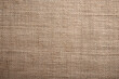 A rustic hessian texture in its natural color, providing a textured and earthy background reminiscent of natural fibers and organic materials, perfect for adding warmth and character to design project