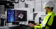 © Andrey Popov - Engineer Doing 3D CAD Model Design On Computer