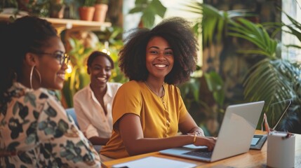 Wall Mural - Group of African American employees or small business owner start-up looking camera working meeting sitting in workplace room, creative workers using technology laptop computer, teamwork entrepreneur