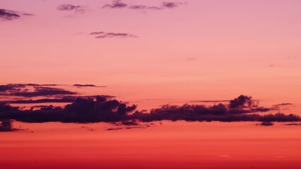 Wall Mural - The beauty of nature is amplified during a sunset, as the sky turns into a colorful masterpiece, time lapse.