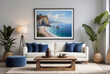 Live edge accent coffee table near white sofa with blue pillows against wall with big poster frame. Coastal home interior design of modern living room.