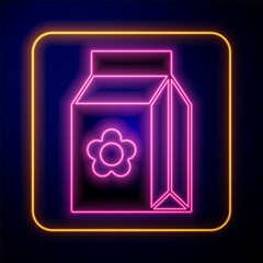 Poster - Glowing neon Pack full of seeds of a specific plant icon isolated on black background. Vector