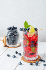 Wall Mural - blueberry mocktail with lime and mint