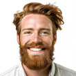 Close-up portrait of a handsome redheaded Irishman smiling with white teeth