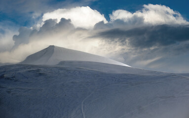 Wall Mural - carpathian winter mountain cloudy landscape.