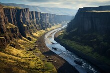 Aerial Perspective Of A Scenic River Gorge With Towering Cliffs On Either Side