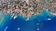 Aerial top down view of Ancient village of Simena beach and yachts, display the historic site and enchanting Mediterranean landscape in Turkey. Daily tour boats stop for a max of 1 hour at village