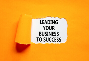Wall Mural - Leading your business to success symbol. Concept words Leading your business to success on beautiful white paper. Beautiful orange paper background. Leading your business to success concept Copy space