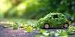 Miniature car with green leaf on nature background. Eco concept.