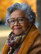 © Andrea Marongiu - Fictional portrait of a pretty elderly black woman pensioner with grey hair, wearing glasses and smiling. Celebrate Black History Month and Afro-american identity. For minority and ethnic rights