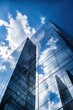 © duyina1990 - Blue glass skyscraper reflecting clouds