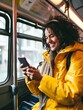 © talkative.studio - Photo a person using smartphone on the bus