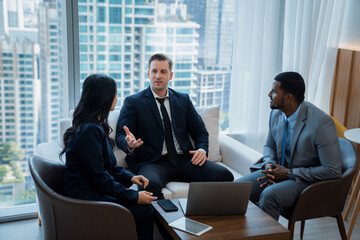 Group of diverse executive investor listening businessman talking about investment. Professional business team discussing about business plan, statistic, marketing strategy at office. Ornamented.