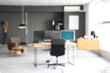 © Pixel-Shot - Blurred view of modern office with computers