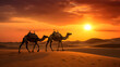 © Trendy Graphics - Camels walking in the arabian desert in sunset