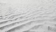 seamless closeup of windswept sand dunes and ripples white sandy beach background texture overlay boho summer vacation backdrop grayscale displacement bump or height map 3d rendering