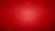 red background in christmas or valentines day red color with vintage texture and shiny center spot