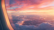 A breathtaking view of a sunset over fluffy clouds, seen from the window of an airplane, symbolizing travel and adventure.
