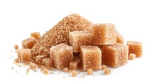 A Pile Of Loose Brown Sugar And Shaped Sugar Cubes, Clearly Shown Against A White Background