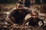 Fototapeta  - father and daughter covered in mud crawl determinedly during a mud run, faces alight with fierce joy and the thrill of the challenge, blurred background