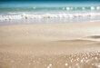 © SR07XC3 - Abstract Beach Scene with Blurred Bokeh Light and Calm Sea and Sky Focused on Sand Foreground