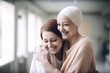 Young woman hugging older mother with cancer in hospital