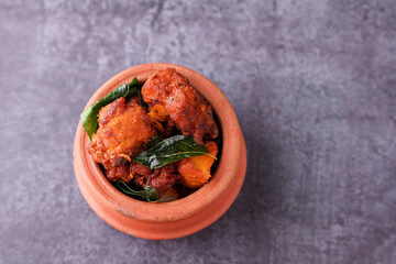 Poster - Fried chicken Kebab or Kabab, Chicken Tikka Masala dark black background Bangalore Hyderabad South India. Top view of Indian non veg food.