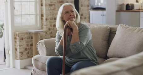 Wall Mural - Senior woman, walking stick and thinking in retirement, support and tool for balance in living room at home. Past, remembering and cane for person with disability, arthritis and alzheimer patient