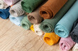 Colorful linen fabric in rolls, textile indistry