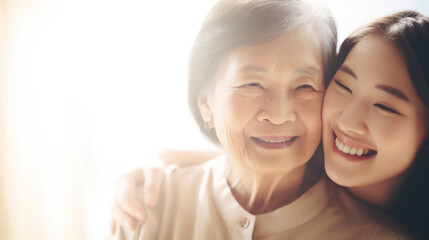 Wall Mural - Happy senior woman enjoying in daughter's affection on Mother's day.