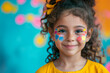 © Nataliia_Trushchenko - Artist painting face of little girl indoors. little girl having her face painted for kids party. carnival family lifestyle Face painting, headshot close up. A happy little girl painted with colorful