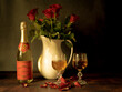 Antique-style still life with champagne and roses on the theme of Valentine's Day.