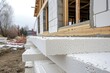 © Lubos Chlubny - Sheets of expanded polystyrene for house thermal insulation during constructions