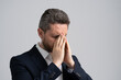 © be free - Business man got migraine touches head because of pain. Tired exhausted man suffering from headache. Business problems. Head pain migraine. Business man in suit with migraine. Job Strain