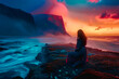 Femme assise sur un rocher sur le rivage au crépuscule