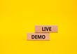 © Natallia - Live Demo symbol. Concept word Live Demo on wooden blocks. Beautiful yellow background. Business and Live Demo concept. Copy space