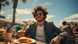 Handsome young man with curly hair and sunglasses is eating hamburgers in a cafe
