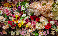 Texture Or Background Of Many Mutlicolored Artificial Flowers, Full Frame Of Flowers