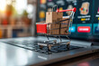 © Gonzalo - Product package boxes and shopping bag in cart with laptop computer which web store shop on screen for online shopping and delivery concept