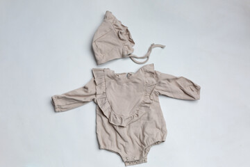 Wall Mural - baby clothes . bodysuit with cap