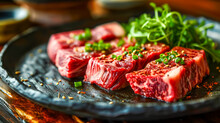 Raw Beef Steak Sliced Cuts With Vegetables On A Black Plate
