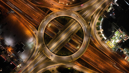 Wall Mural - Aerial drone slow shutter night photo of illuminated urban elevated toll ring road junction and interchange overpass passing through Kifisias Avenue, Attica, Greece