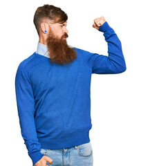 Sticker - Young irish redhead man wearing casual clothes showing arms muscles smiling proud. fitness concept.