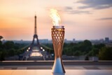 Fototapeta  - symbol of Olympic Sports games 2024 flame torch on Paris Eiffel tower background